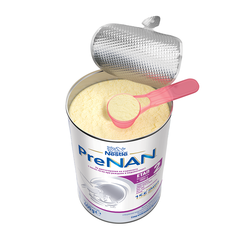 Open can of Nestlé PreNAN baby formula powder with a pink scoop