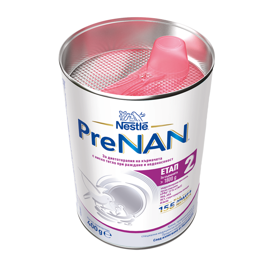 Nestlé PreNAN stage 2 infant formula can with pink scoop
