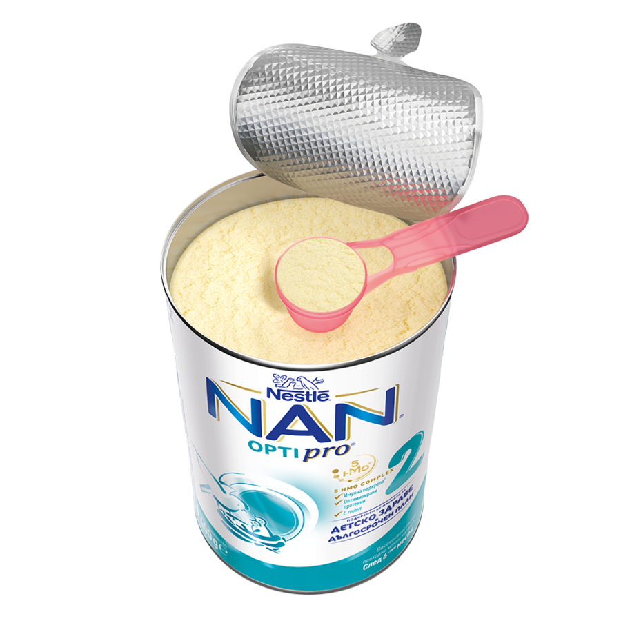 Opened NAN Optipro infant formula can with pink scoop