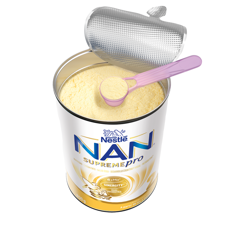 opened can of Nestlé NAN SupremePro infant formula with pink scoop