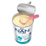 Open can of NAN Optipro 3 baby formula with pink scoop